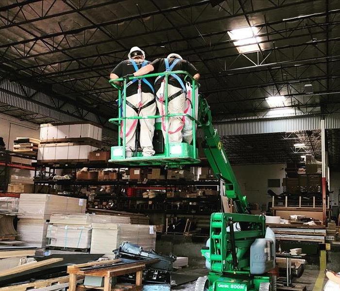 Two Techs on a Lift