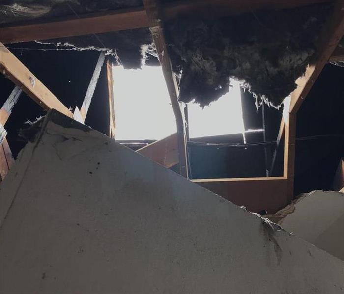 A hole was burnt through the ceiling of this home