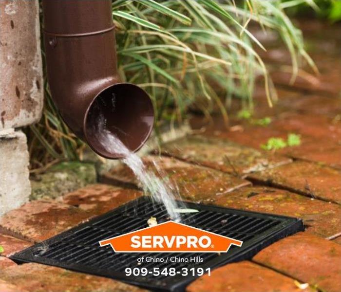 A properly working downspout takes water away from a commercial property.