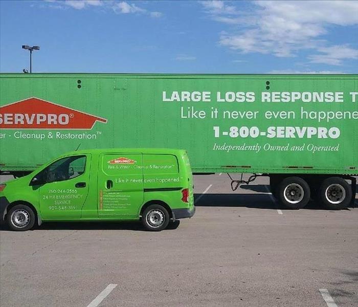Two Servpro Trucks